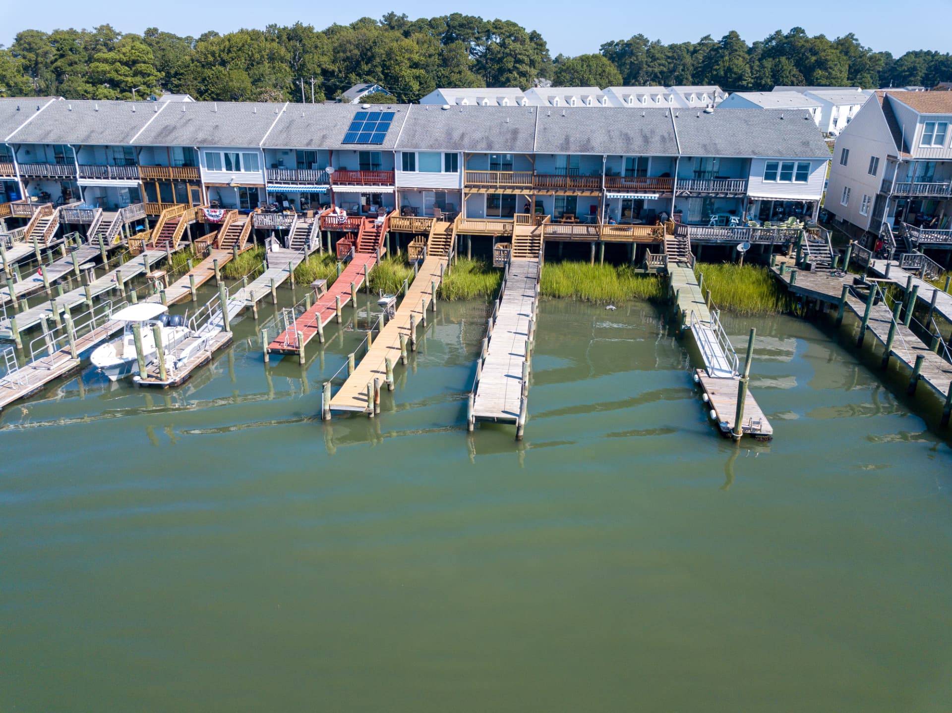 Aerial view of the docks and townhomes along the channel at Channel Landing
